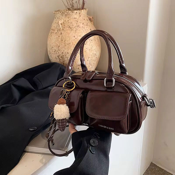 Bolso de mano con bolsillos delanteros